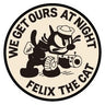 Round fabric patch with Felix the Cat and the text “WE GET OURS AT NIGHT”