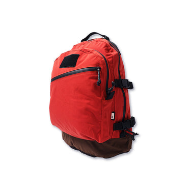 Red Mini 3 Day Lite backpack with black front pocket zipper and side buckle straps