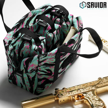 Tiger stripe mini hauler with front pocket, zipper closure, and crossbody strap