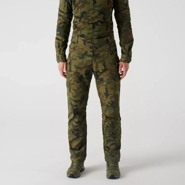 Camouflage field pants with straight legs, side seams, and cuffs with elastic hems.
