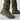 Green camouflage field pants with boot-friendly cuffs and rugged hiking boots