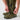 Camouflage field pants with leg zipper and snap cuff near ankle