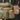 Tan tactical chest rig pouch detail with medic patch, zip pockets, and yellow insert