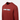 Rusty red crewneck sweatshirt with Helikon TEK chest logo, close-up