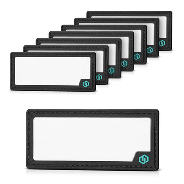 Writable ID patches with dark edges and blank inserts, stack of rectangular labels