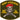 Olive green embroidered patch with skull, US cap, crossed rifles, and patriotic text