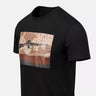 Black crewneck T-shirt with desert camouflage chest graphic, side view