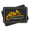 Dark rubber Velcro logo patch with yellow Helikon-Tex logo and hook-and-loop backing