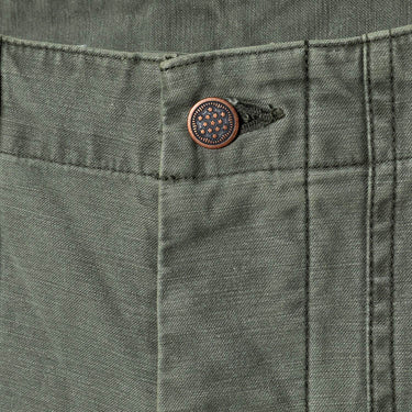 Olive drab pants waistband with snap button closure and stitch detail