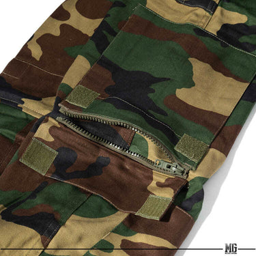 Woodland camouflage cargo pants with zipper fly and button closure.