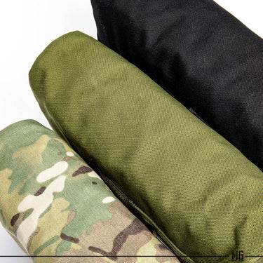 Roll-up dump pouch lining detail in olive fabric with dark inner panel