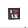 Black I Love AK patch with red heart; hook-and-loop backing