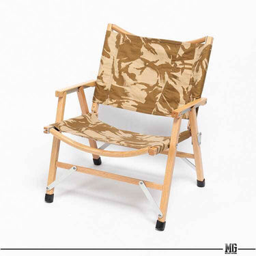 Foldable camping chair in tan desert camo fabric with wooden armrests and slatted seat base