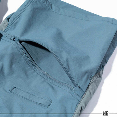 Light blue cargo shorts with stitched side pocket and seam details