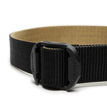 Two-tone nylon belt with black webbing and tan inner strap, square buckle close-up