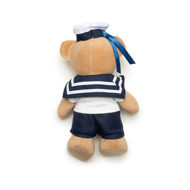 Sturm navy teddy bear plush from behind wearing sailor outfit with blue neck ribbon
