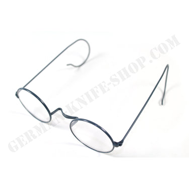 Wire-frame eyeglasses with dark blue temples and oval lenses