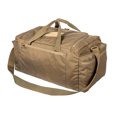 Tan training duffel bag with top handle, front zip pocket, padded side grab straps