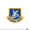 Security Forces flash patch: blue fabric, gold border, white eagle over emblem