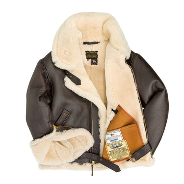 Brown leather sheepskin jacket with cream shearling lining and interior pocket detail