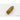Brass-colored replica bullet lying on its side, rounded nose and base
