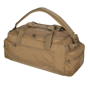 Urban training bag in tan with padded top handle, front zip organizer pocket, and side pocket