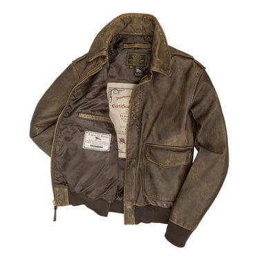 Brown leather A-2 bomber jacket with visible lining, zip front and chest pocket.